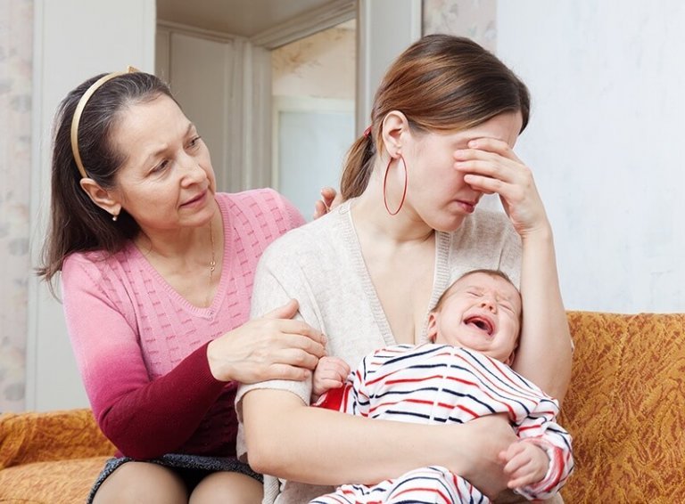 Hoe herkennen we een postnatale depressie