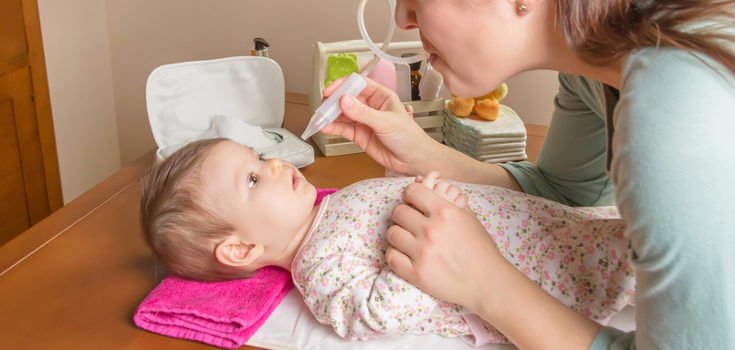 Moeder en kind Moeder met pipet