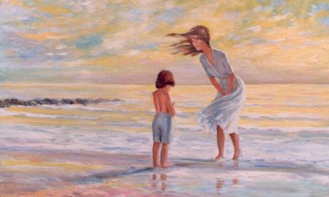 Moeder en kind op het strand