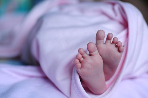 Voetjes van pasgeboren baby