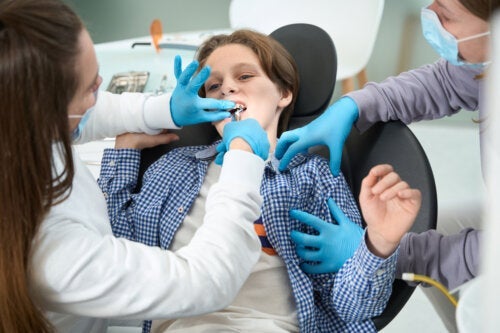 Doen tandextracties bij kinderen pijn?